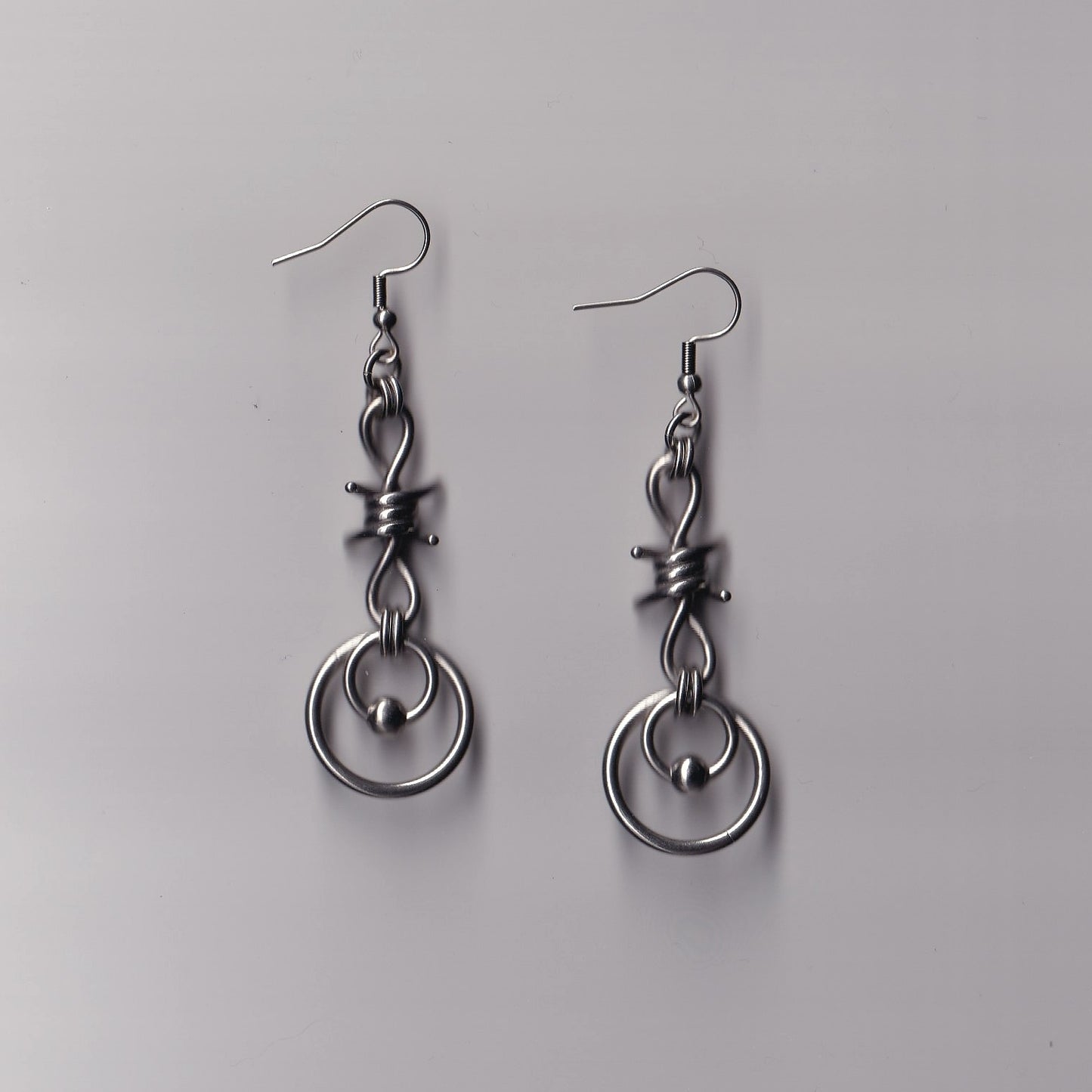 the barbed wire charm earrings