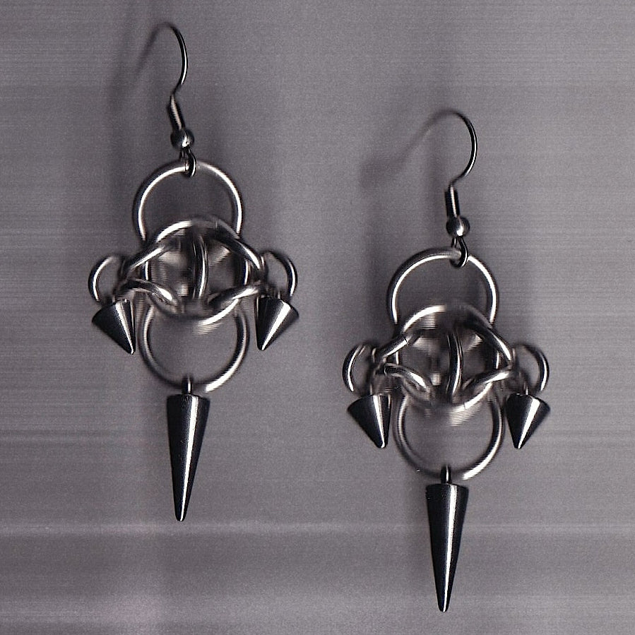 the oracle spike earrings