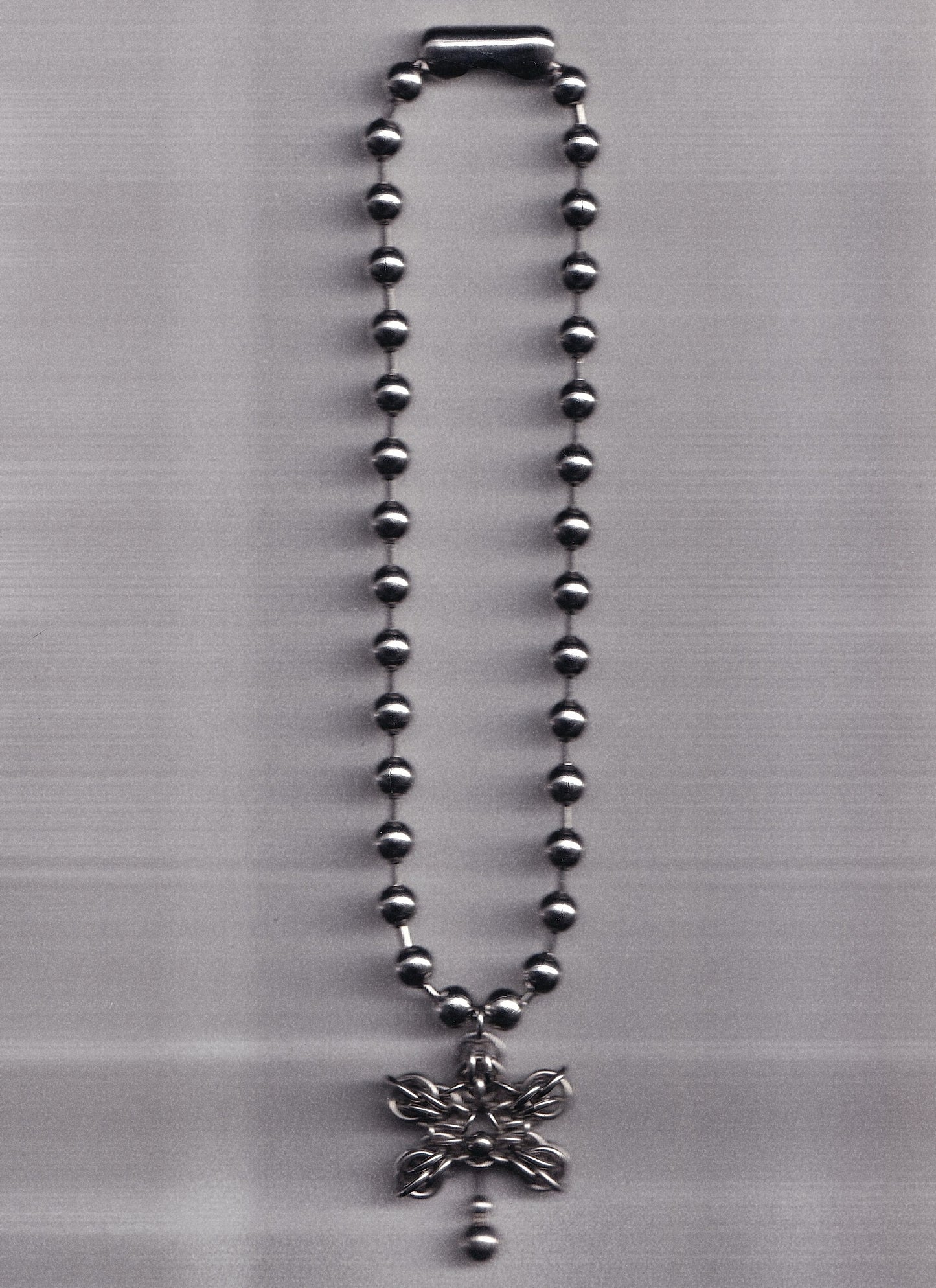 the pierced orchid pendant ball chain