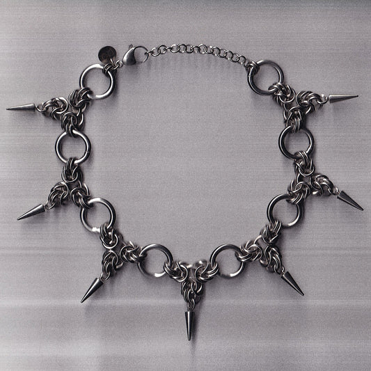 the triad spike choker