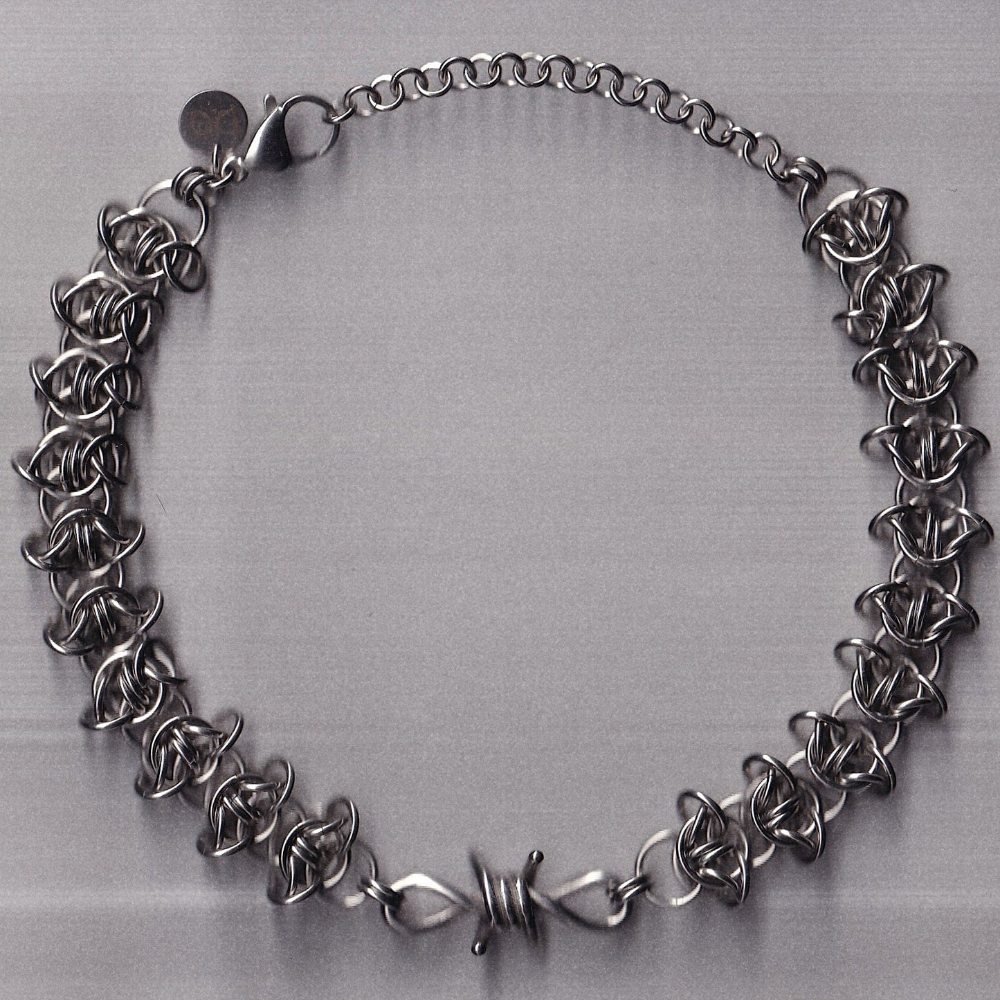 the barbed wire charm choker