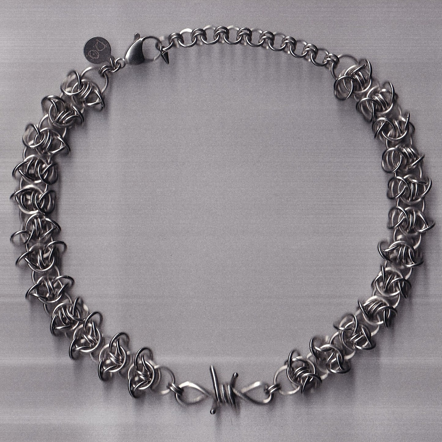 the barbed wire charm collar