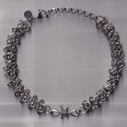 the barbed wire charm collar