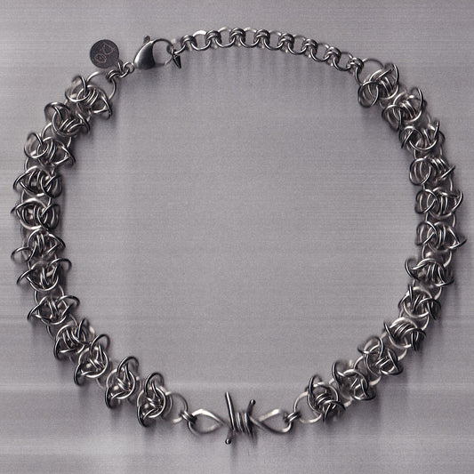 the barbed wire charm collar