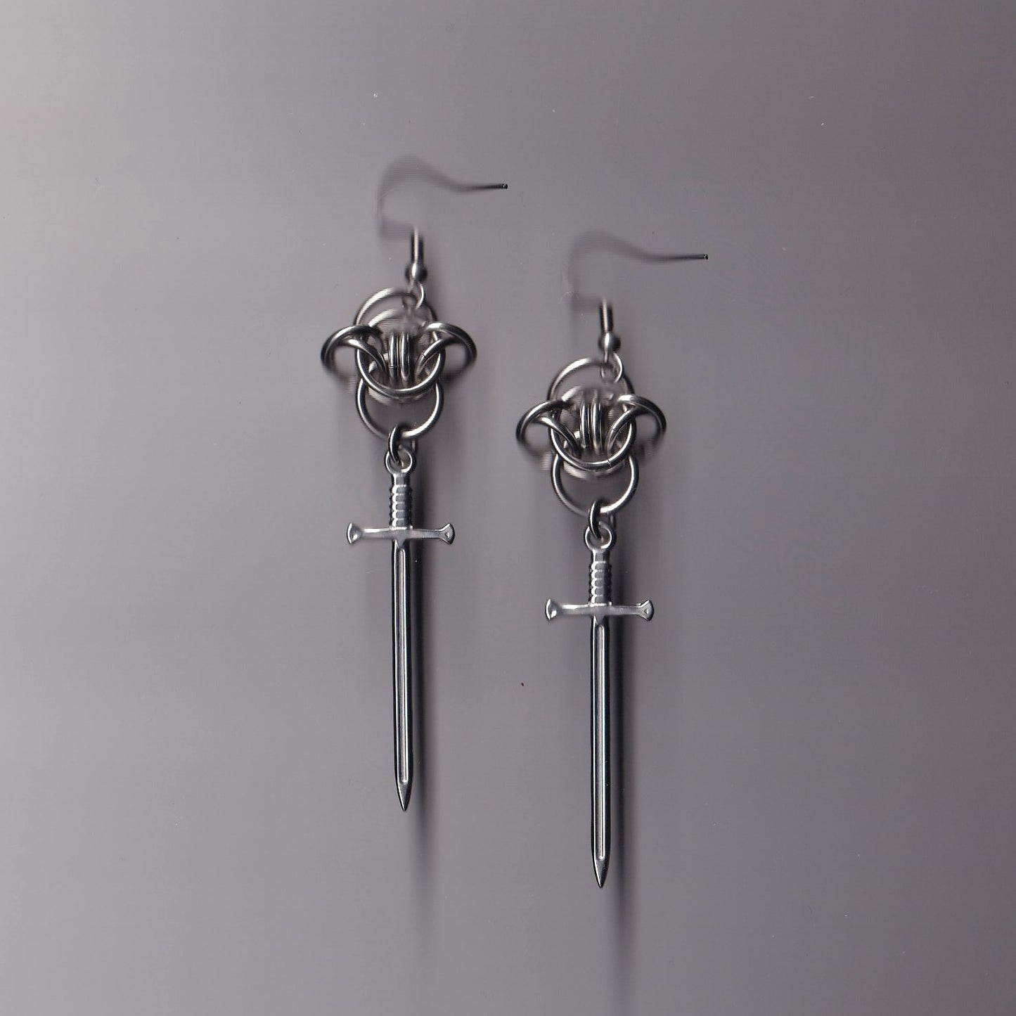the barbed wire sword earrings