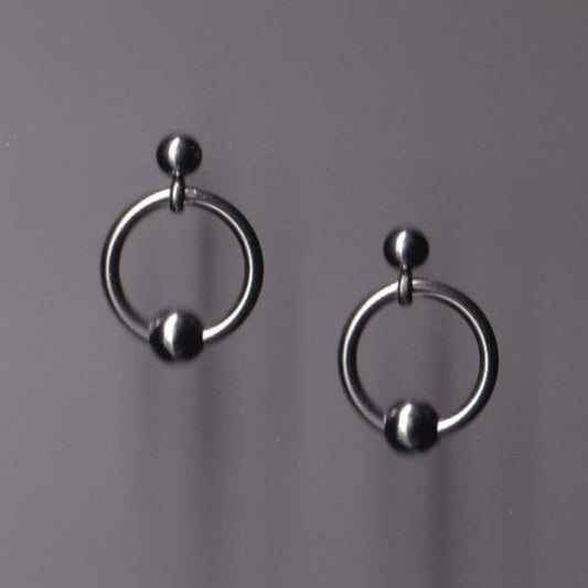 the pierced stud earrings