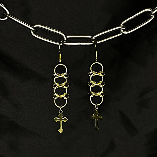 the naked centipede cross earrings in brass