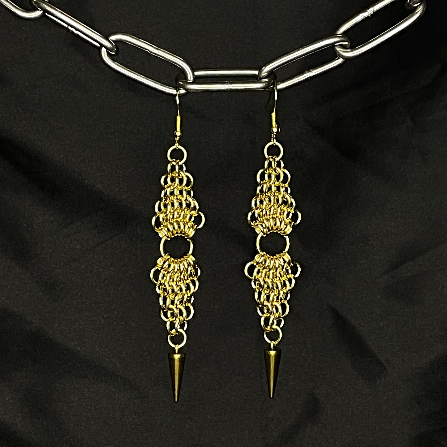 the double european spike earrings in brass