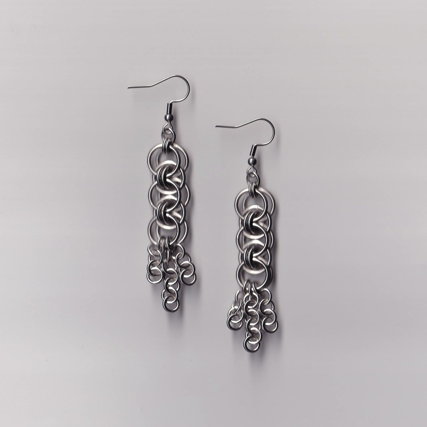 the helm tassle earrings