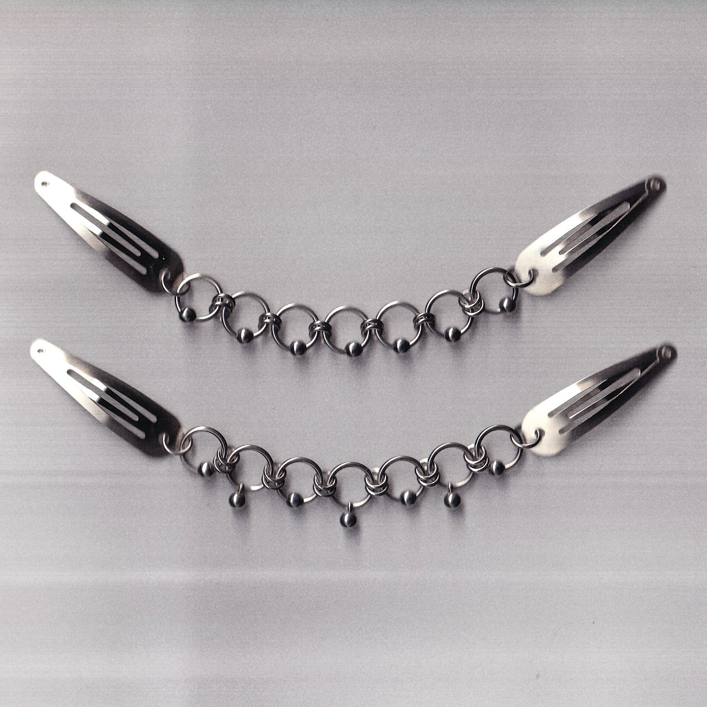 the 'pierced' paired clips
