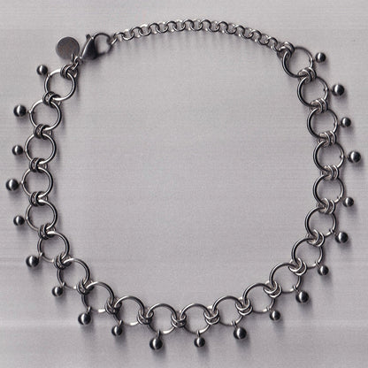 the dangly pierced choker