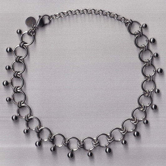 the dangly pierced choker