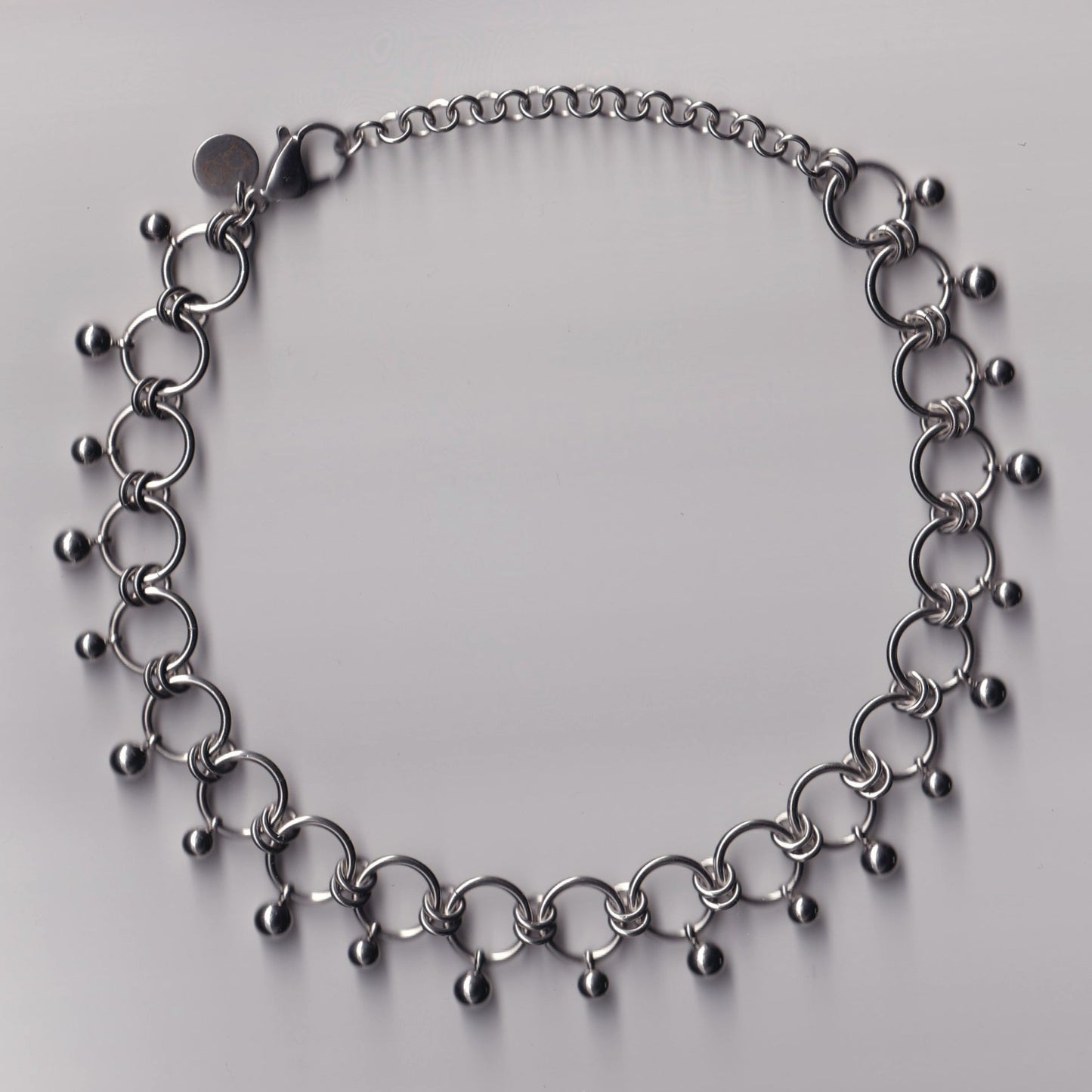 the dangly pierced choker