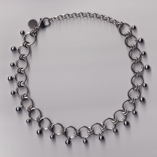the dangly pierced choker