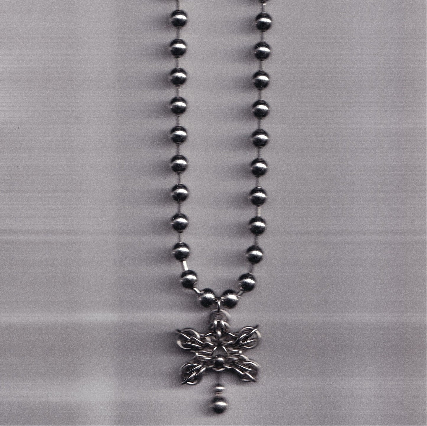 the pierced orchid pendant ball chain