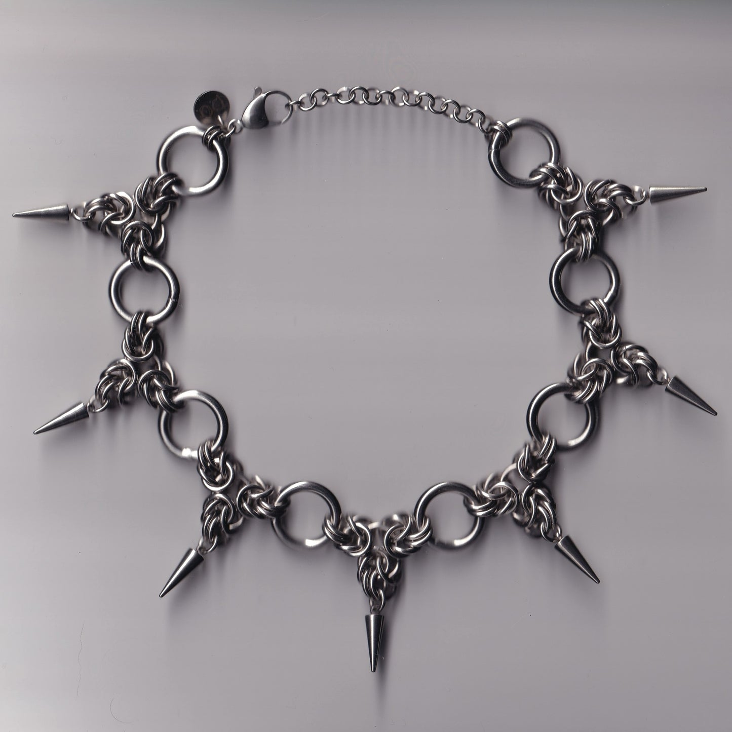 the triad spike choker