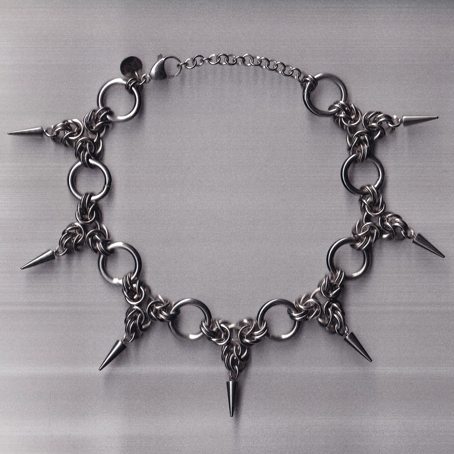 the triad spike choker